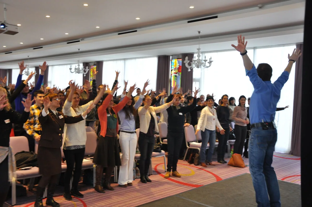 Participants taking part in a group exercise indoors