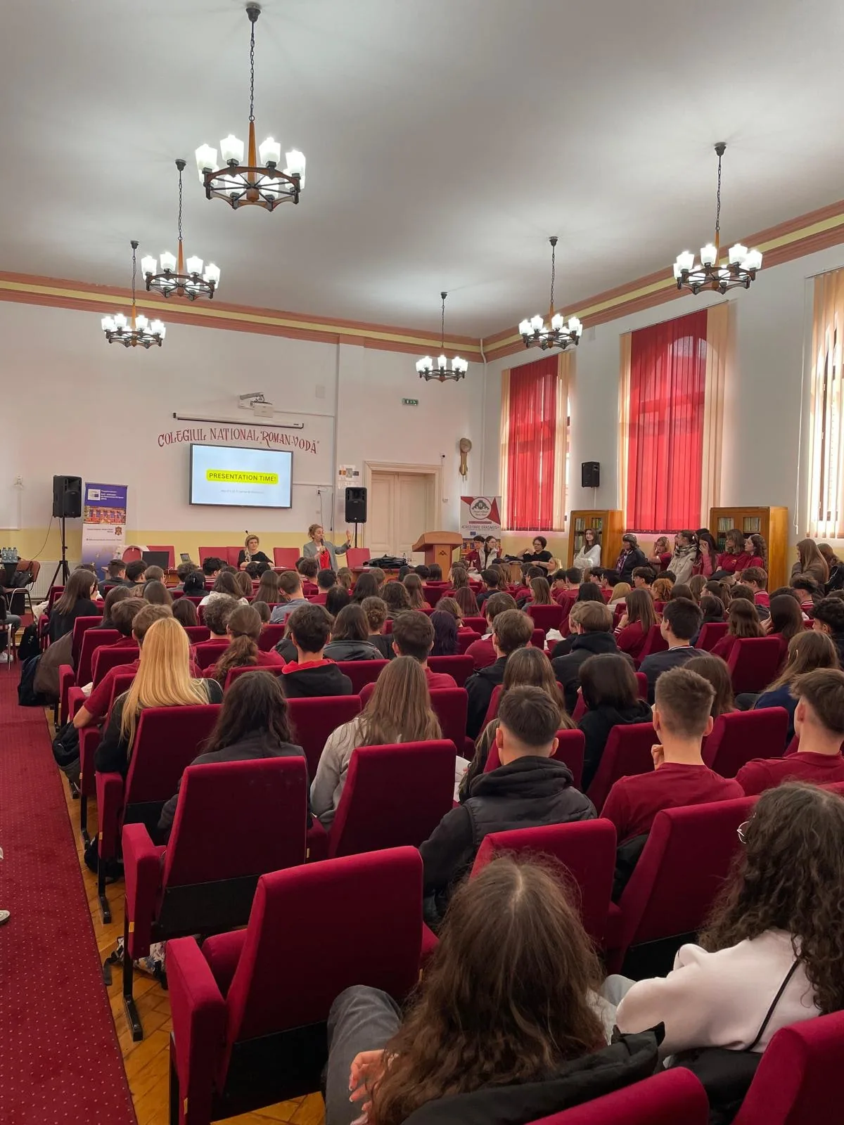 An audience gathered in a room for a learning activity